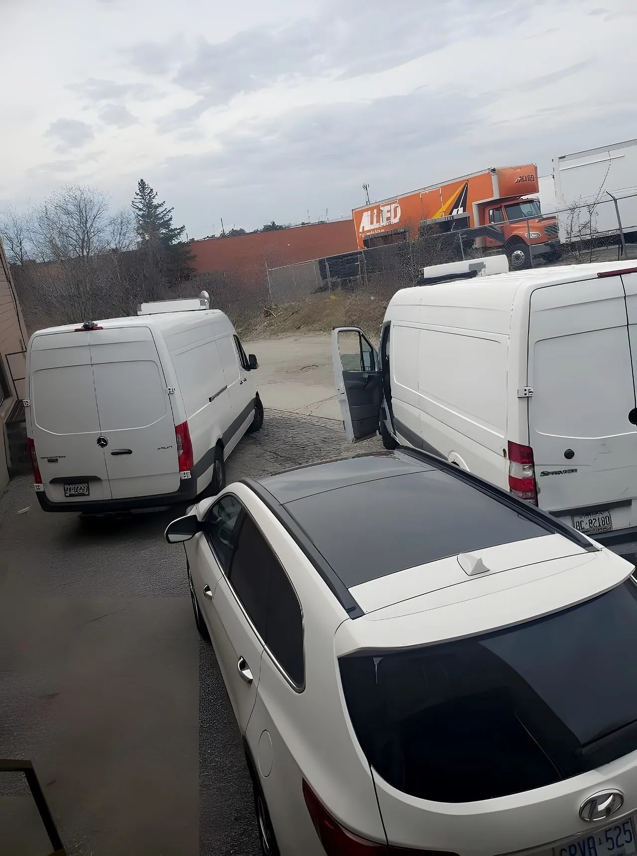 Premium Foods delivery vans in the yard